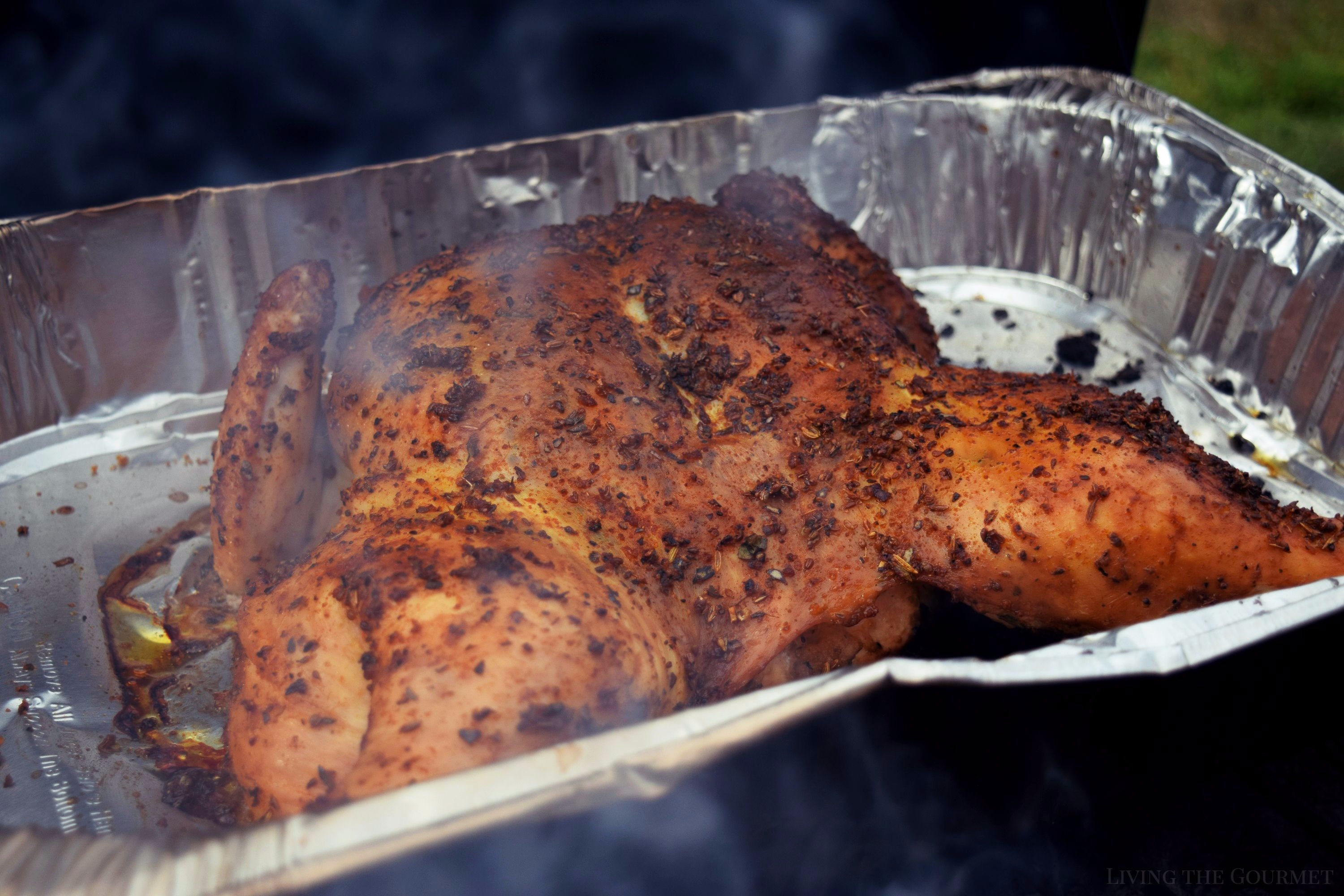 Living the Gourmet: Spatchcocked Chicken is a simple technique that will guarantee a perfectly cooked chicken throughout.  Grill it up on the BBQ for a delicious and easy meal.