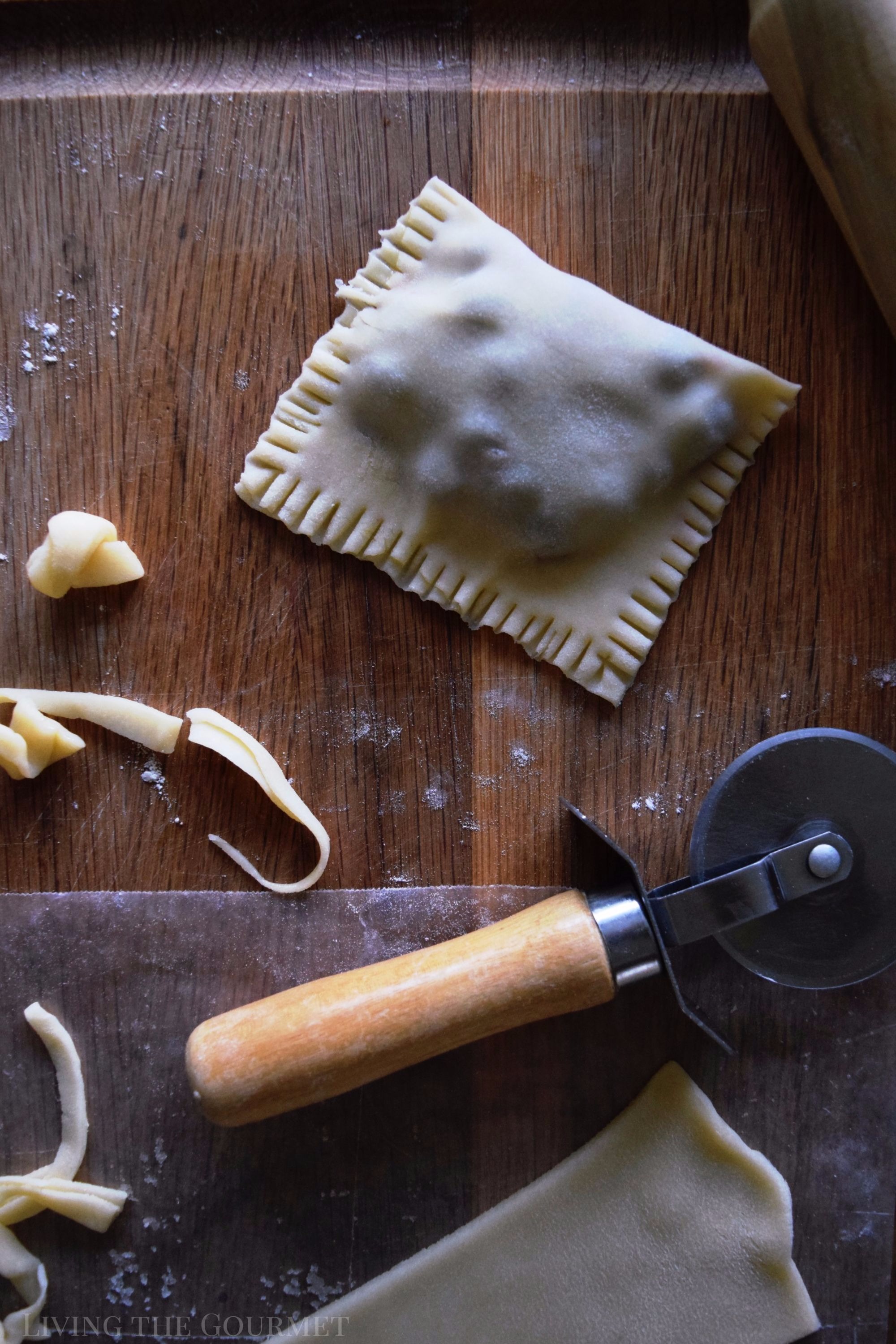 Living the Gourmet: Baked into a delicate, buttery crust, these Blueberry Basil Hand Pies are bursting with the flavors of the summer.