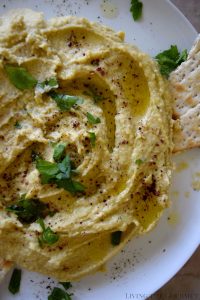 Living the Gourmet: Hummus is one of the healthiest and easiest recipes you can make. This Spicy Hummus is only a handful of ingredients away!