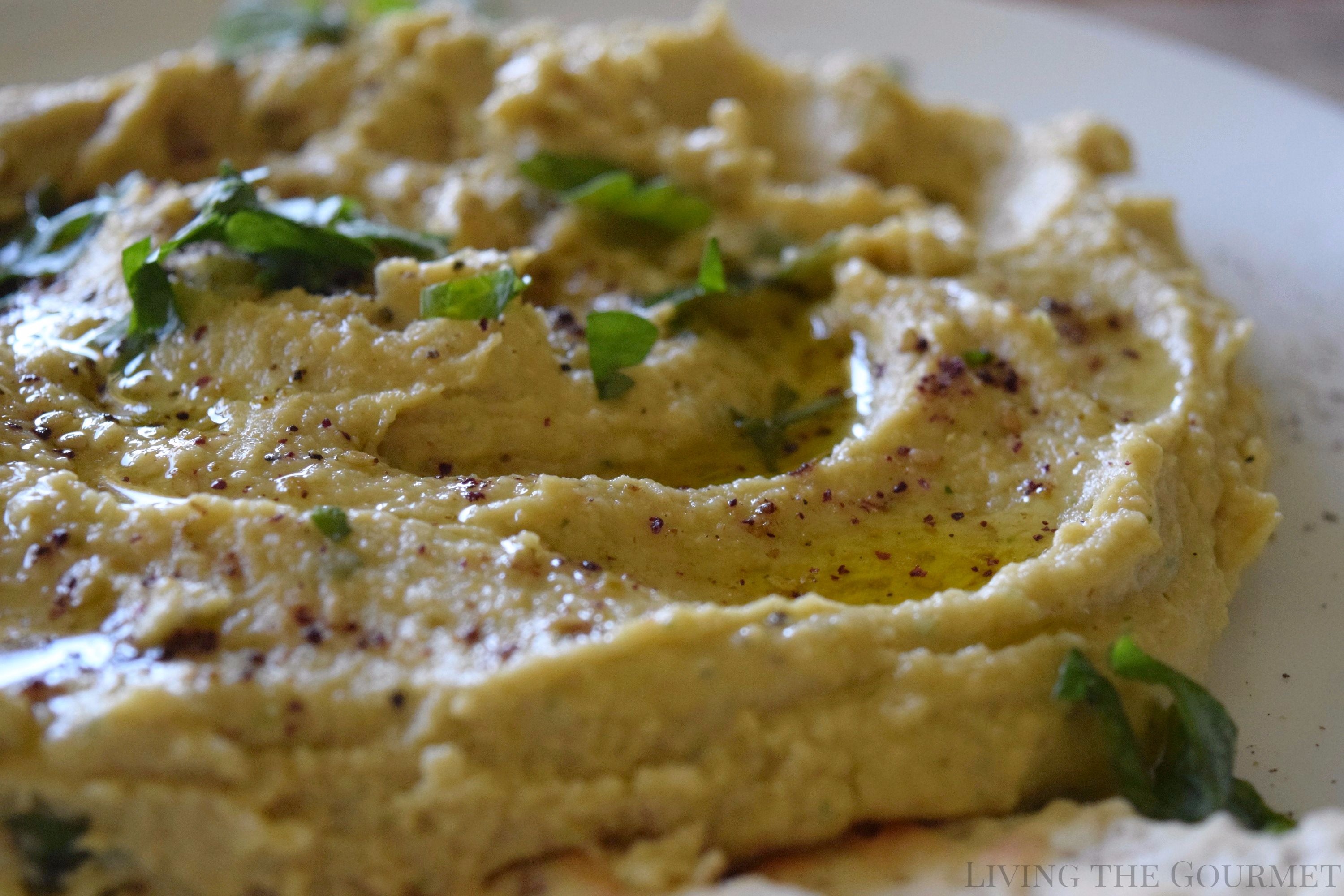 Living the Gourmet: Hummus is one of the healthiest and easiest recipes you can make. This Spicy Hummus is only a handful of ingredients away!