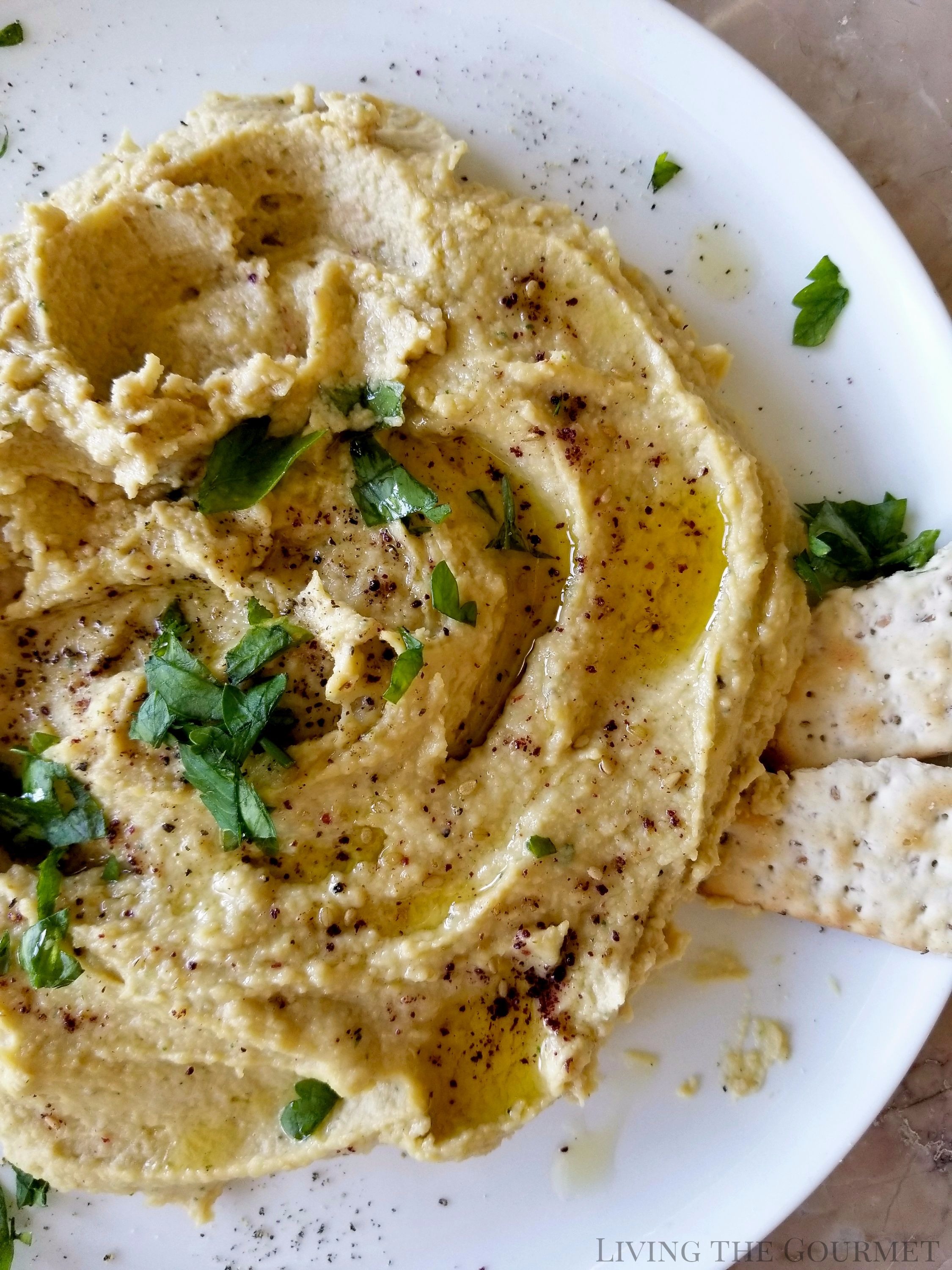 Living the Gourmet: Hummus is one of the healthiest and easiest recipes you can make. This Spicy Hummus is only a handful of ingredients away!