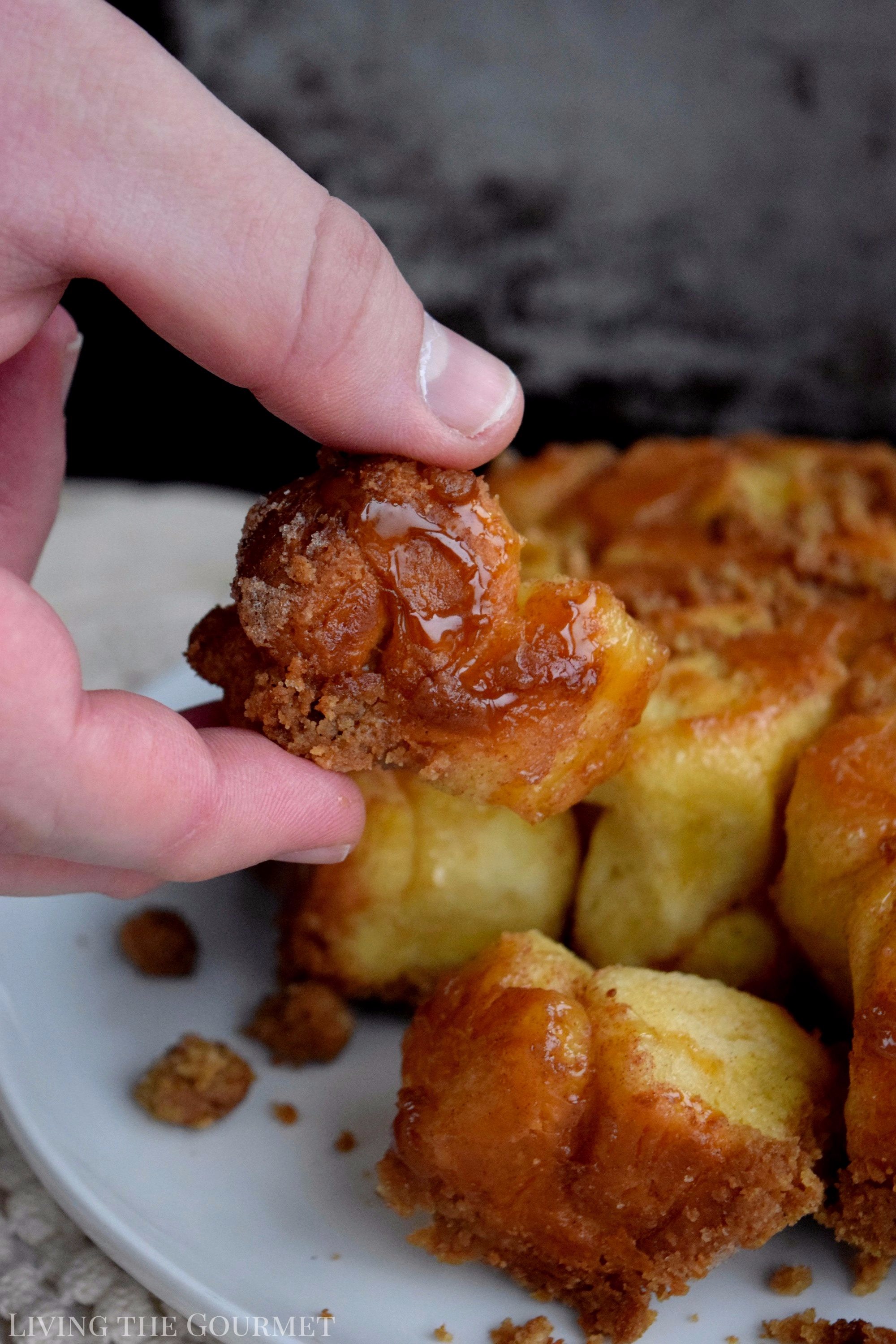 The mornings are getting chillier and the days are getting shorter, time to break out those cozy knit sweaters and get out baking game on. This Coffee Bubble Bread is a cross between coffee cake and monkey bread. It's sweet, sticky and perfect in the AM with your favorite cup of java.