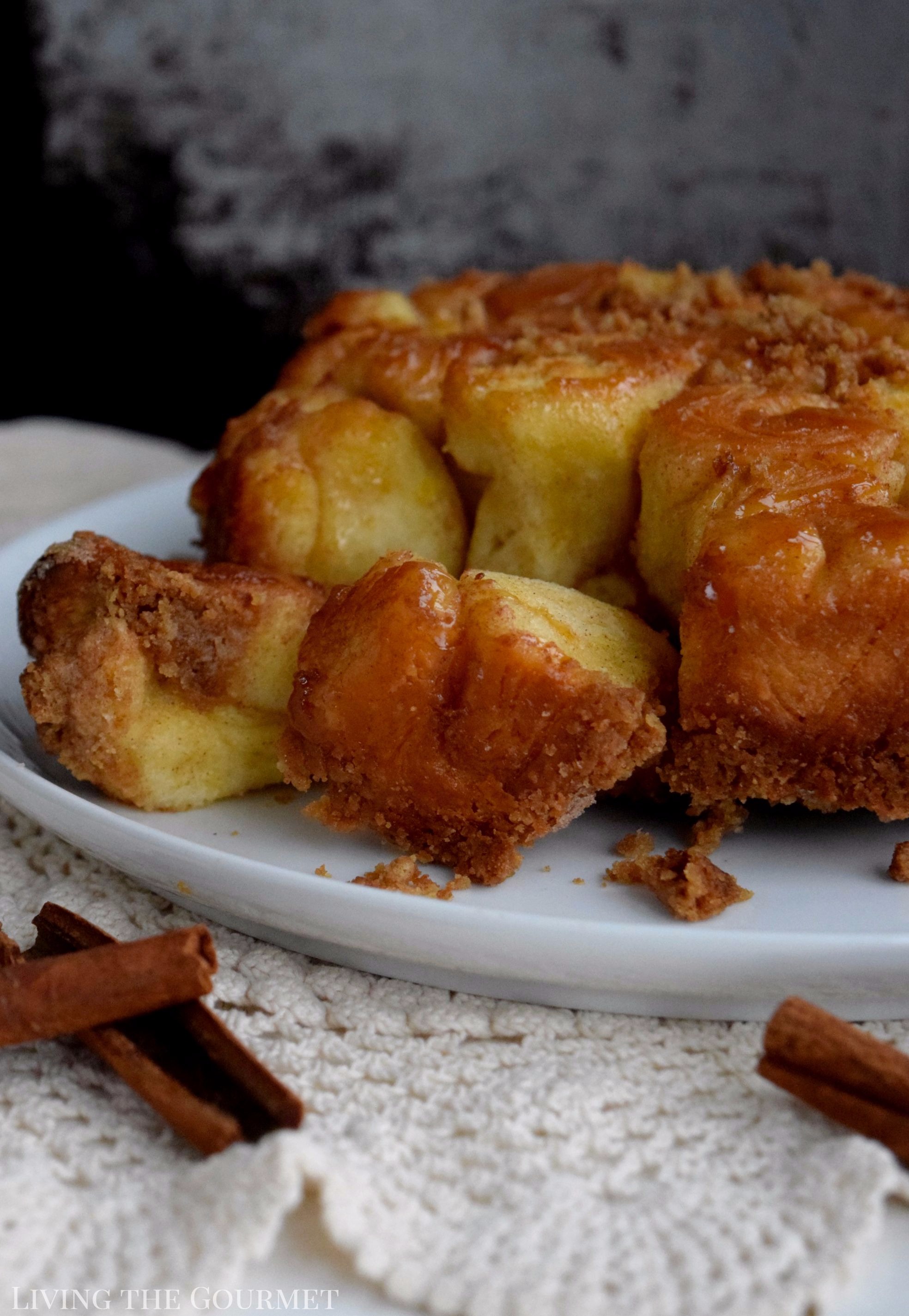 The mornings are getting chillier and the days are getting shorter, time to break out those cozy knit sweaters and get out baking game on. This Coffee Bubble Bread is a cross between coffee cake and monkey bread. It's sweet, sticky and perfect in the AM with your favorite cup of java.