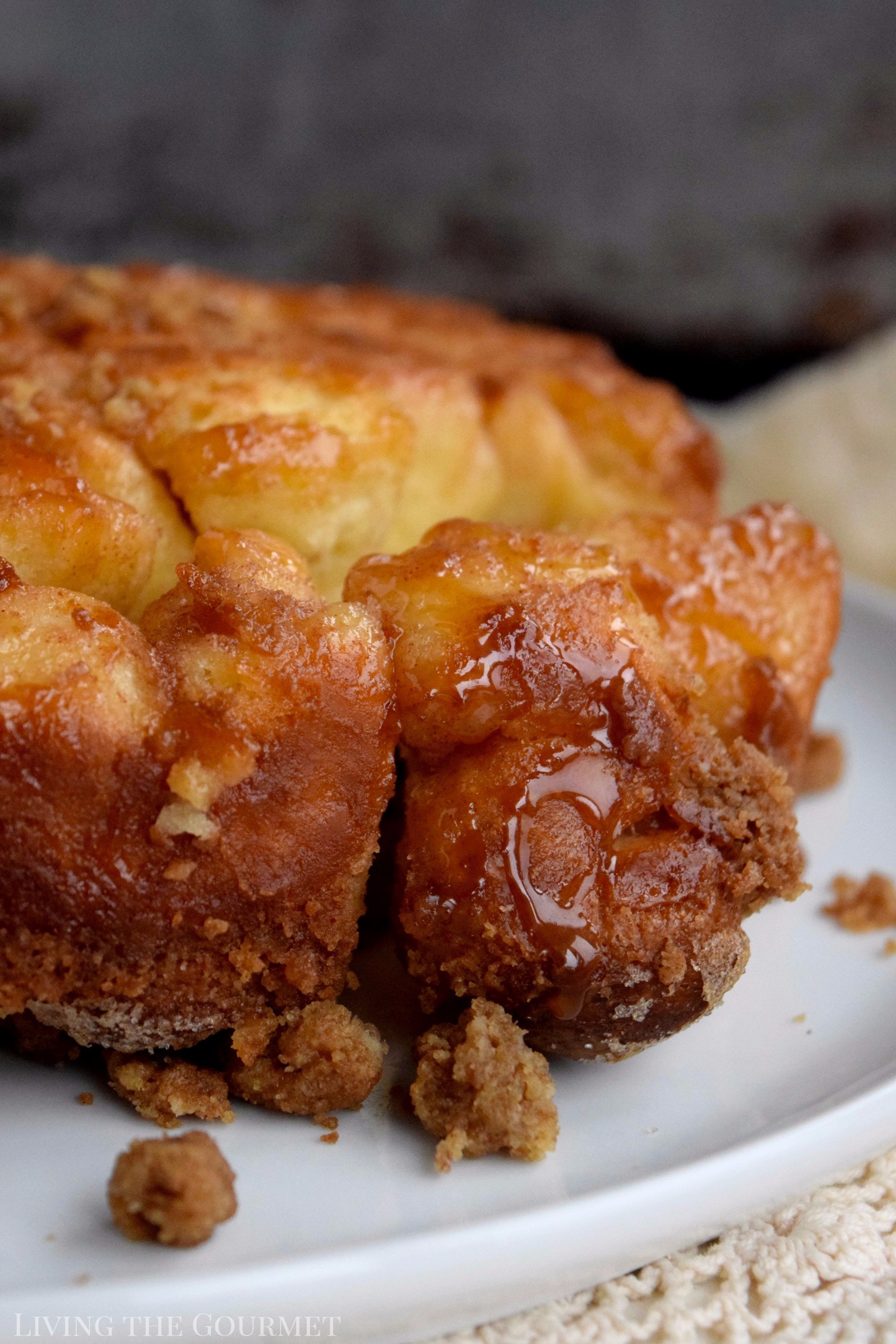 The mornings are getting chillier and the days are getting shorter, time to break out those cozy knit sweaters and get out baking game on. This Coffee Bubble Bread is a cross between coffee cake and monkey bread. It's sweet, sticky and perfect in the AM with your favorite cup of java.