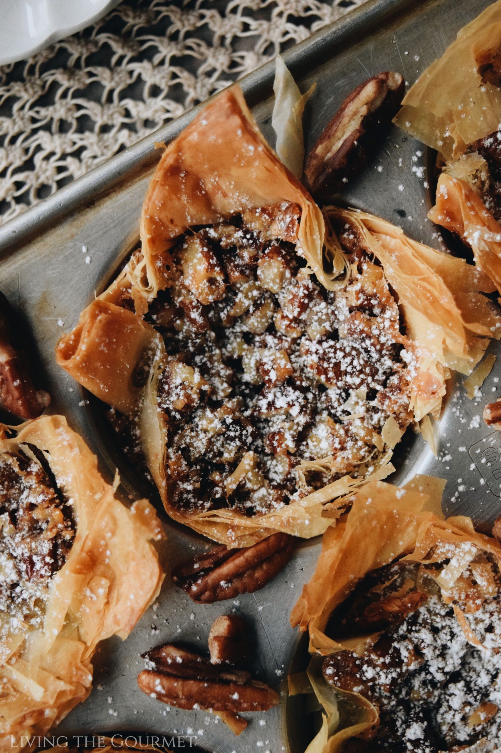 Phyllo pastry cups filled with traditional pecan pie. Take pecan