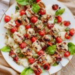 Chicken Skewers with mozzarella, tomatoes, and basil