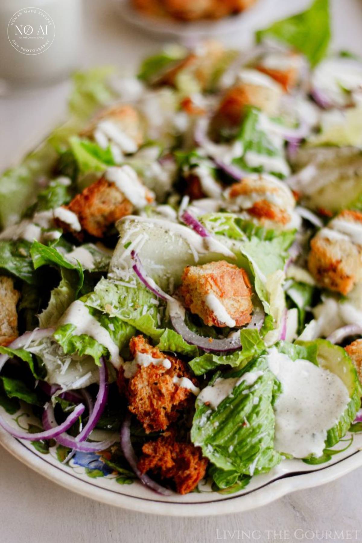 Today's Caesar Salad starts off with crisp Romaine lettuce leaves, thinly sliced red onions, and crunchy cucumbers, tossed with savory Parmesan cheese and golden croutons.