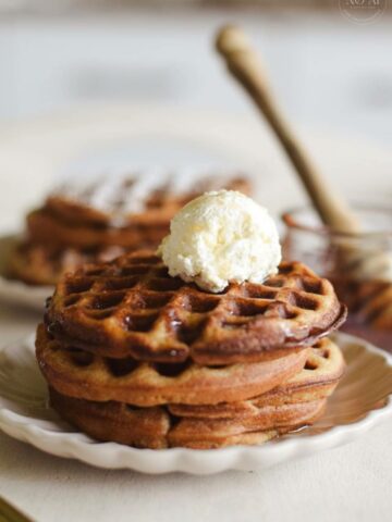 These Gluten-free Waffles are served with whipped honey cream. It's a perfectly cozy breakfast for brisk fall mornings or long lazy weekends.