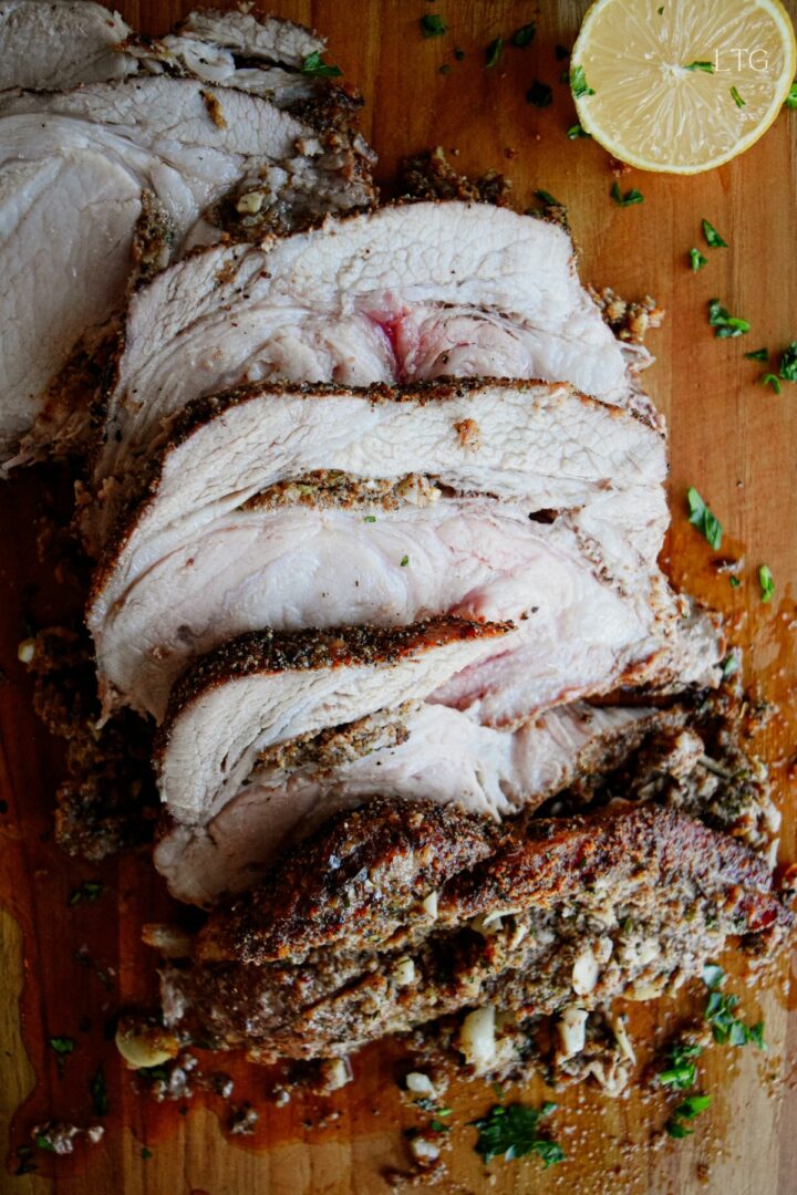 Garlic and Herb Stuffed Rib End Pork Roast - Living The Gourmet