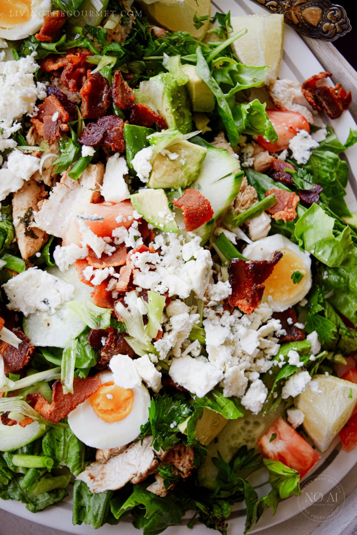 Cobb salad feature grilled chicken, bacon, jammy eggs, and tossed greens