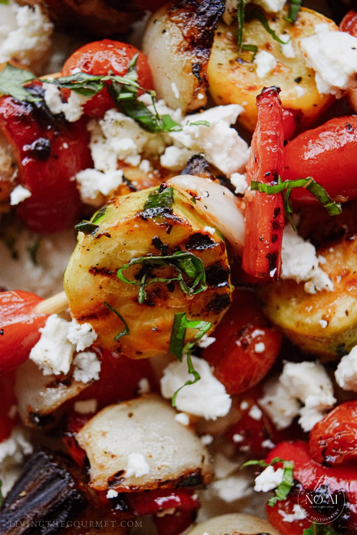 Grilled vegetables straight off the griddle with crumbled feta and basil.