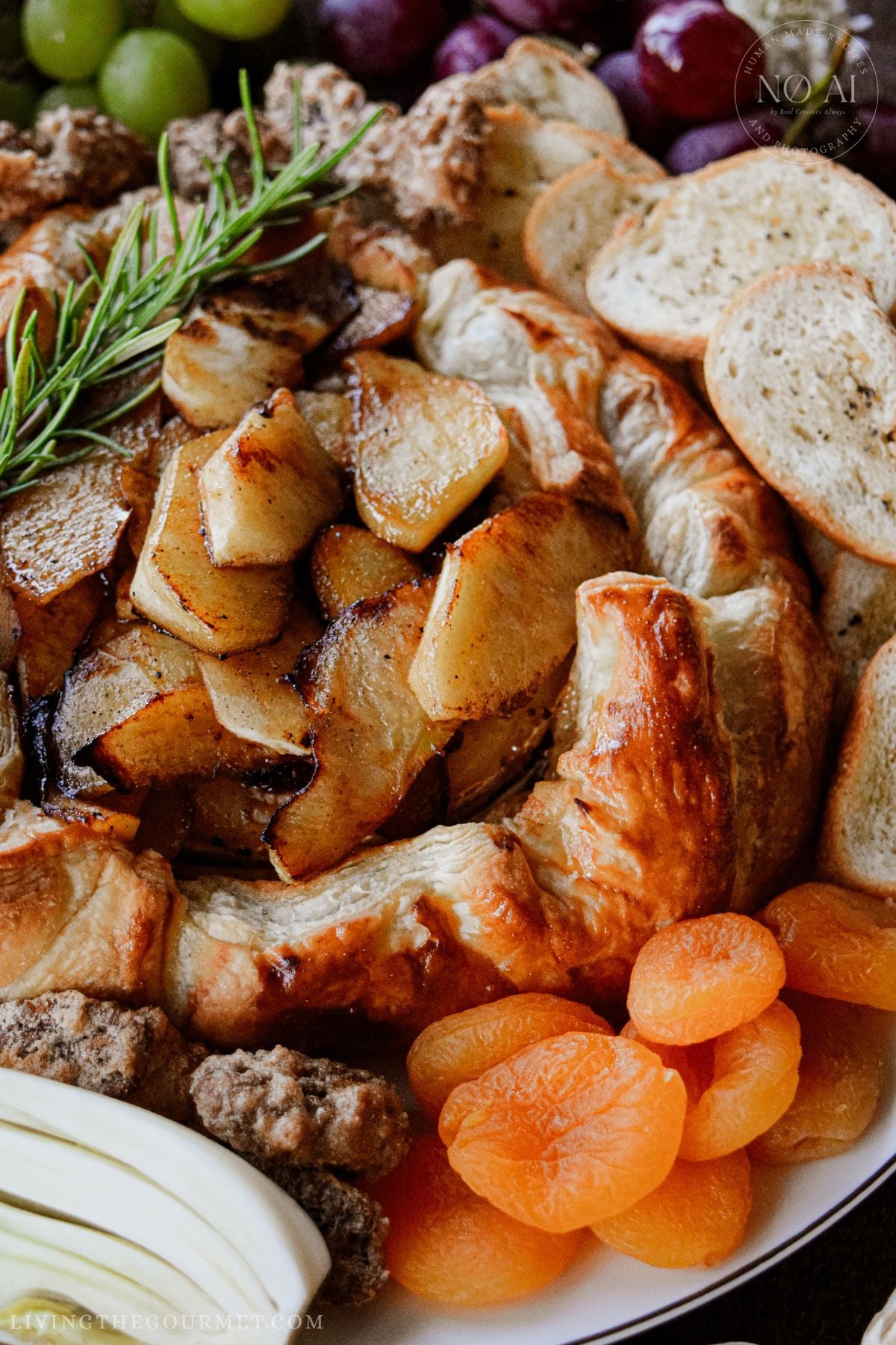 Baked Camembert Cheese baked in Puff Pastry and topped with Caramelized Apples