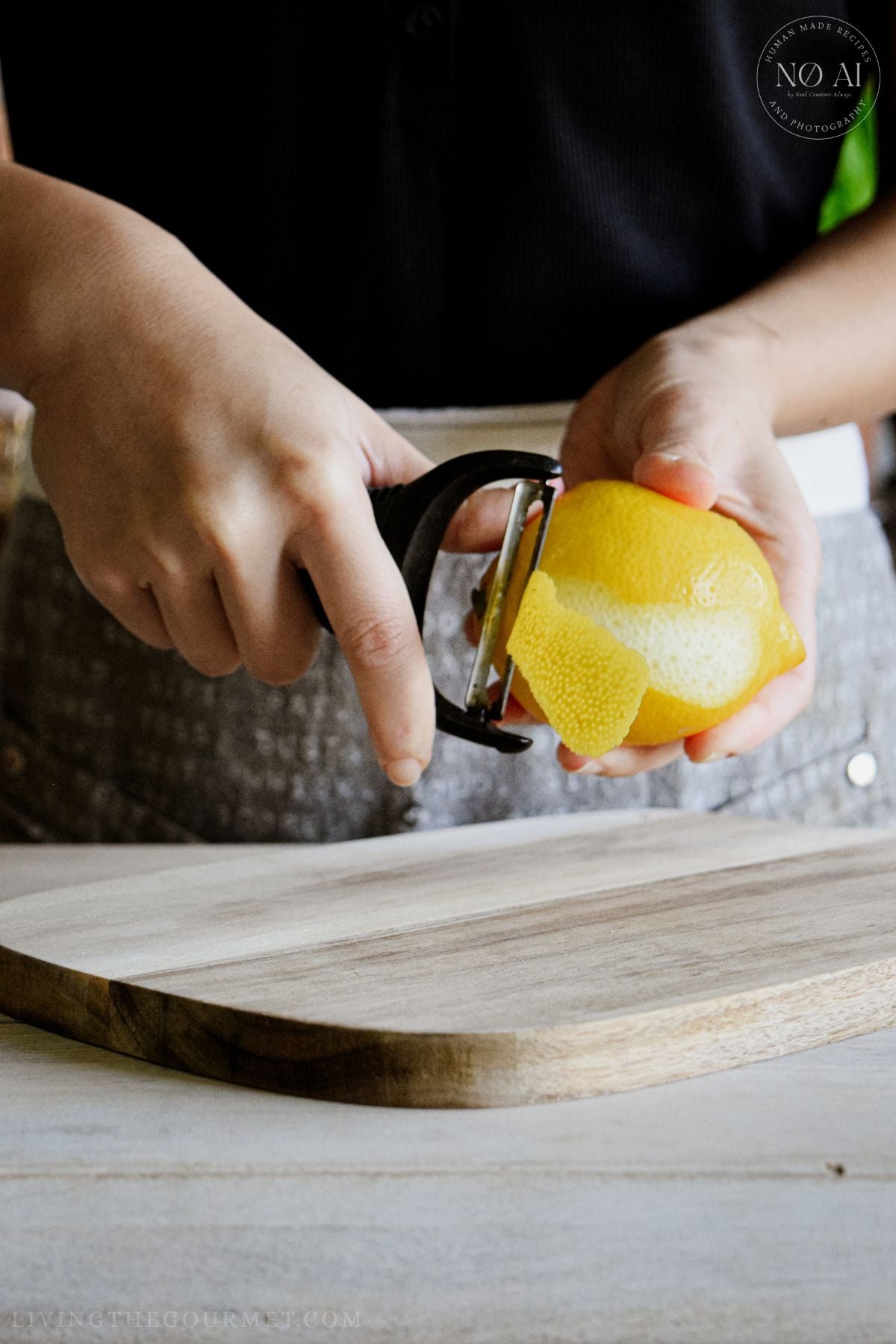 Peeling a fresh lemon