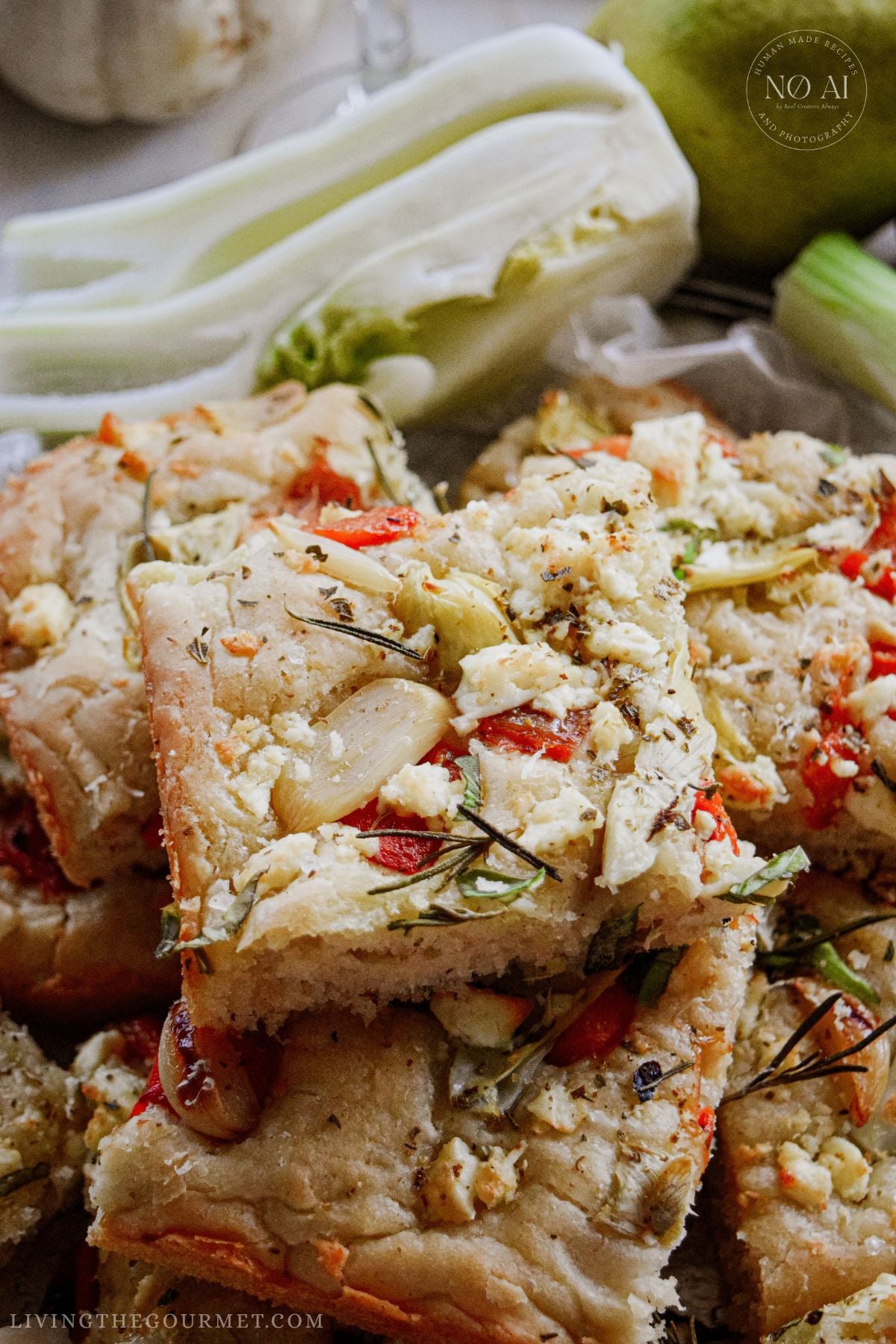 Homemade Roasted Garlic and Artichoke Focaccia with olive oil and feta cheese